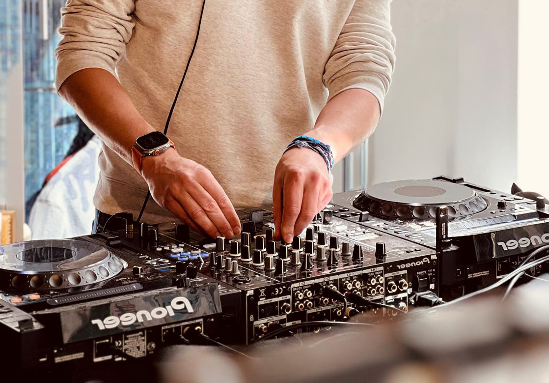 Josh Creamers behind the Pioneer CDJs